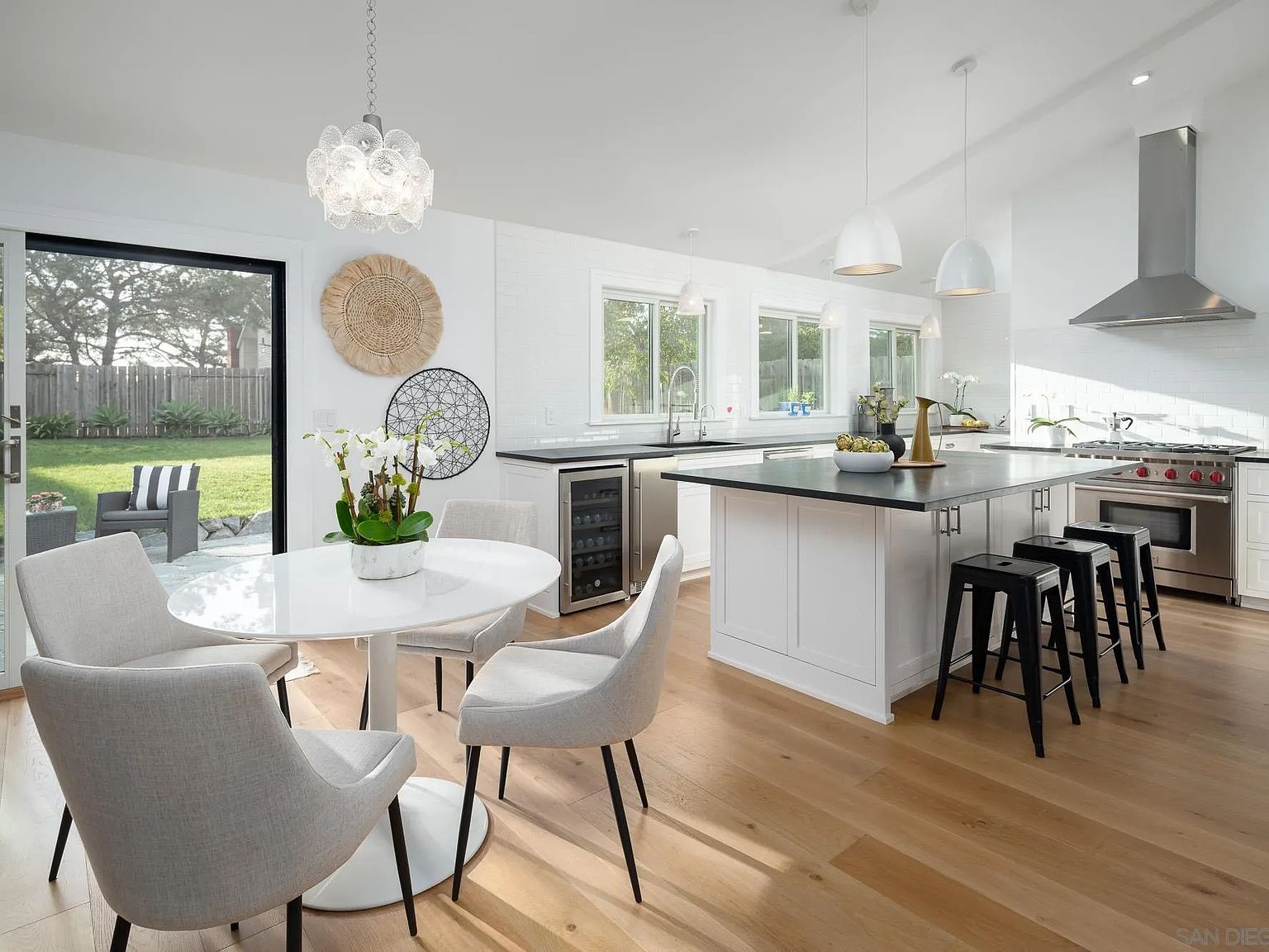 Chef's kitchen and dining area opening to the rear yard