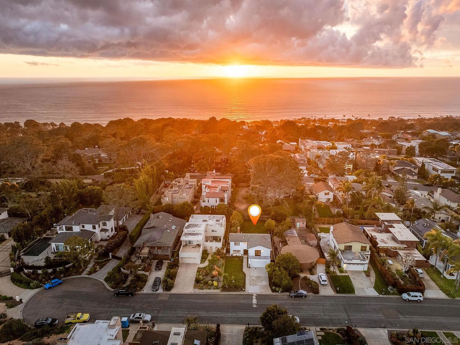 Aerial view of the Del Mar neighborhood at sunset over the ocean